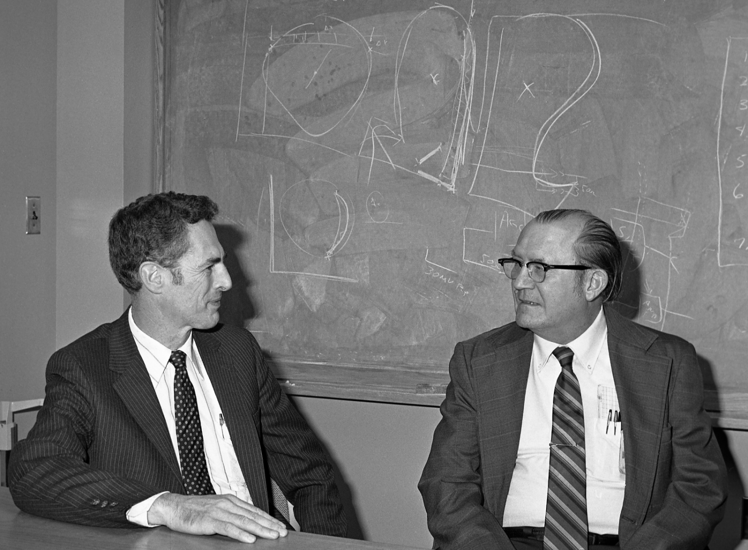 Cline Frasier and Hal Laning Seated at a Table Cline Frasier and Hal Laning Seated at a Table