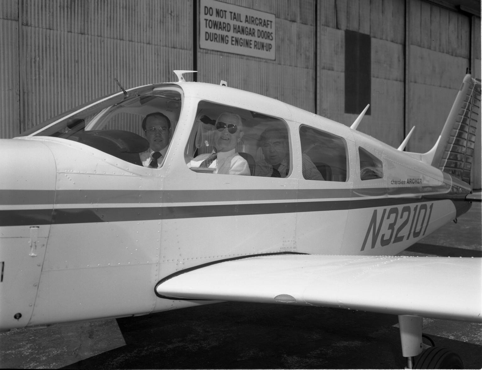 Chip Collins and Doc Draper In An Airplane At Bedford Flight Facility