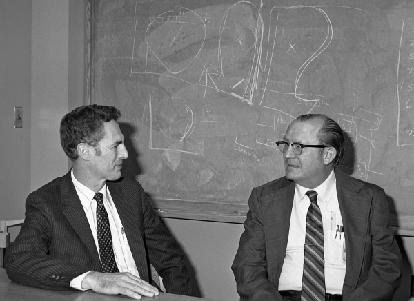 Cline Frasier and Hal Laning Seated at a Table