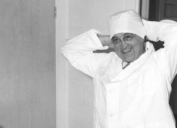 Dr. Draper Putting On Clean Room Suit Dr. Draper Putting On Clean Room Suit