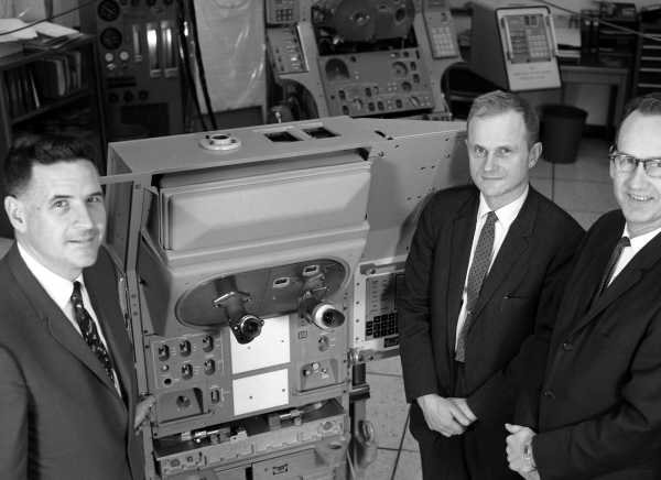 Joseph Shea Joseph Shea with Dave Hoag and Ralph Ragan Looking At Apollo Guidance Navigation & Control Hardware