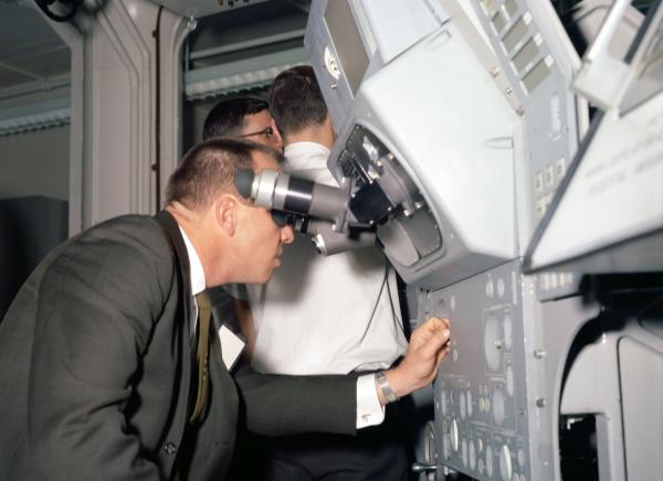 Alan Shepard with the Primary Guidance, Navigation, and Control System Simulation Alan Shepard with the Primary Guidance, Navigation, and Control System Simulation