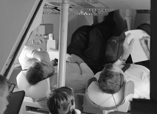 Astronauts in the Command Module Simulator Astronauts in the Command Module Simulator