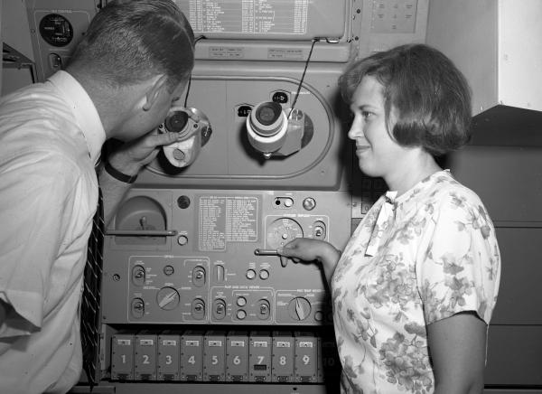 Engineers with the Apollo Primary Guidance, Navigation, and Control System Mock-Up Engineers with the Apollo Primary Guidance, Navigation, and Control System Mock-Up