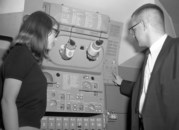 Engineers with the Apollo Primary Guidance, Navigation, and Control System Mock-Up Engineers with the Apollo Primary Guidance, Navigation, and Control System Mock-Up