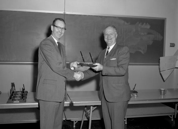Ralph Ragan Presenting Lewis Levson with the 3% Cost Reduction Award Ralph Ragan Presenting Lewis Levson with the 3% Cost Reduction Award