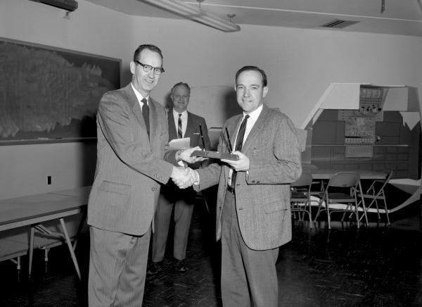 Ralph Ragan Presenting Tom Anderson with the 3% Cost Reduction Award Ralph Ragan Presenting Tom Anderson with the 3% Cost Reduction Award