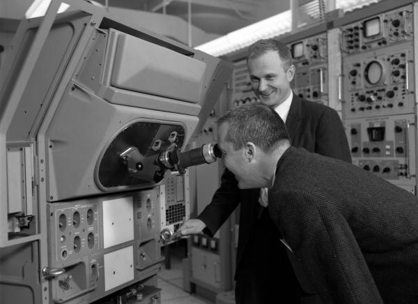 McDivitt and Hoag Looking at Apollo Guidance Navigation & Control Hardware McDivitt and Hoag Looking at Apollo Guidance Navigation & Control Hardware