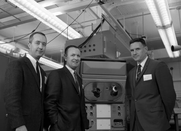 McDivitt, Shea, and NASA's Craft Looking At Apollo Guidance Navigation & Control Hardware McDivitt, Shea, and NASA's Craft Looking At Apollo Guidance Navigation & Control Hardware