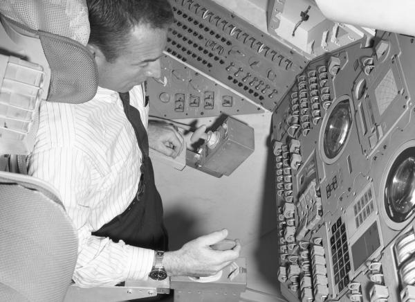 Astronaut Jim Lovell in the Command Module Simulator Astronaut Jim Lovell in the Command Module Simulator