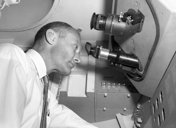 Astronaut Buzz Aldrin in the Command Module Simulator Astronaut Buzz Aldrin in the Command Module Simulator