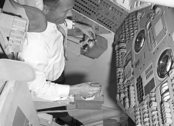 Astronaut Buzz Aldrin in the Command Module Simulator Astronaut Buzz Aldrin in the Command Module Simulator