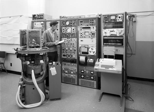 MIT Lab Engineer testing Apollo Analog Computer MIT Lab Engineer testing Apollo Analog Computer