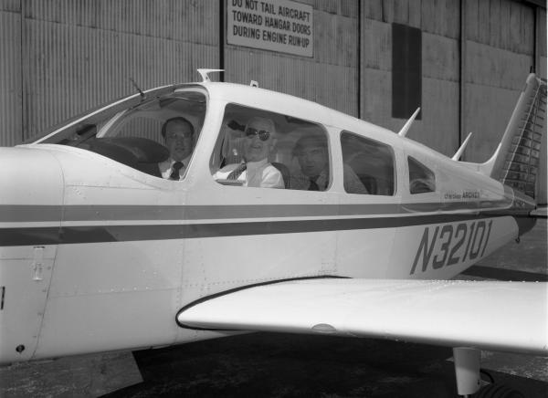 Chip Collins and Doc Draper In An Airplane At Bedford Flight Facility Chip Collins and Doc Draper In An Airplane At Bedford Flight Facility